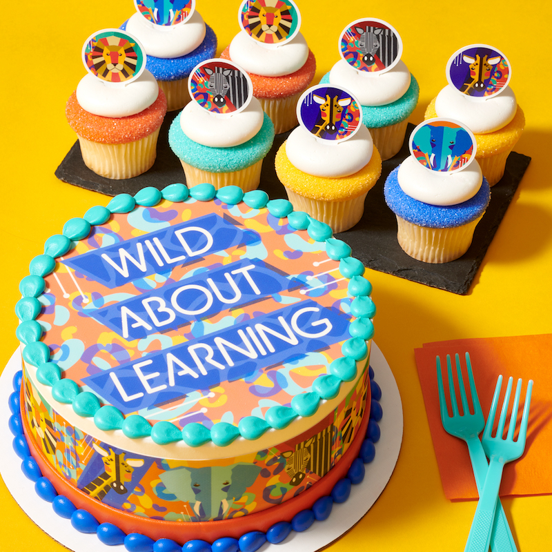 back to school edible cake topper with design of wild about learning with jungle safari animal theme